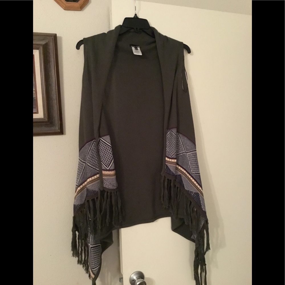 Green knit vest with Native American detail